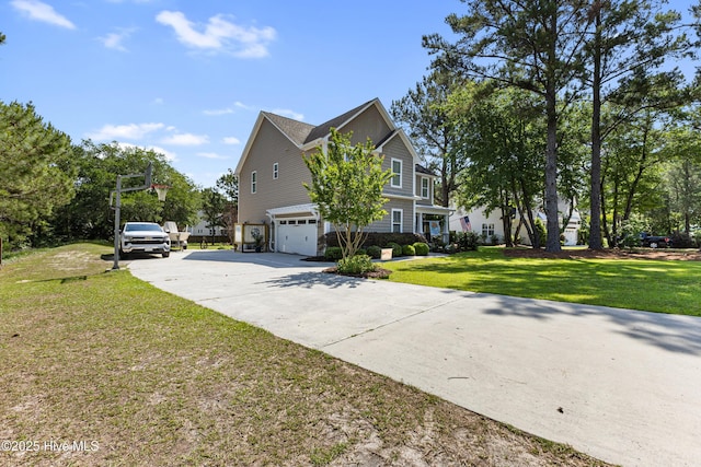 157 Heritage Way, Hampstead, NC 28443 - view of home's exterior featuring an attached garage, driveway, and a yard