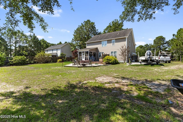 157 Heritage Way, Hampstead, NC 28443 - back of house with a sunroom and a patio area