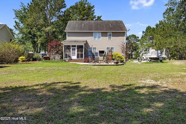 157 Heritage Way, Hampstead, NC 28443 - back of property featuring a sunroom and a patio area