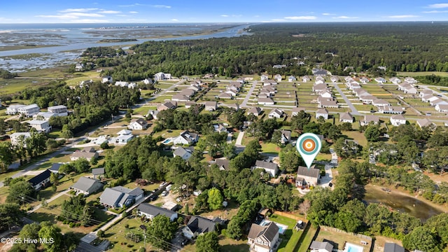157 Heritage Way, Hampstead, NC 28443 - aerial view of property and surrounding area featuring a forest, a large body of water, and nearby suburban area