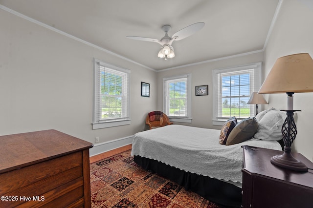 410 Craven St, Bath, NC 27808 - bedroom featuring crown molding, wood finished floors, baseboards, and a ceiling fan