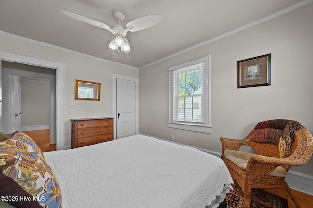 410 Craven St, Bath, NC 27808 - bedroom with ornamental molding, wood finished floors, baseboards, and a ceiling fan