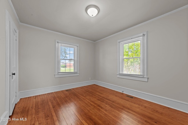 410 Craven St, Bath, NC 27808 - spare room with hardwood / wood-style flooring, ornamental molding, and baseboards