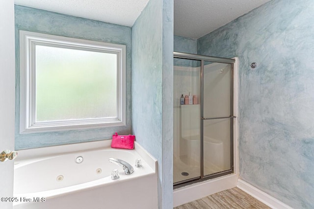 2 Beryl Cir, Pinehurst, NC 28374 - full bathroom with a stall shower, a jetted tub, wood finished floors, a textured ceiling, and baseboards