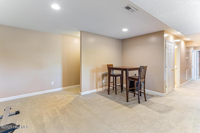 2 Beryl Cir, Pinehurst, NC 28374 - carpeted dining space with baseboards, recessed lighting, and a textured ceiling