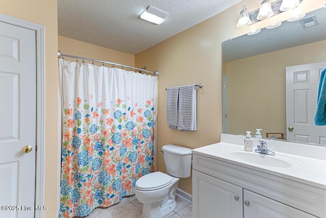 2 Beryl Cir, Pinehurst, NC 28374 - full bath with tile patterned flooring, vanity, toilet, a textured ceiling, and a shower with shower curtain