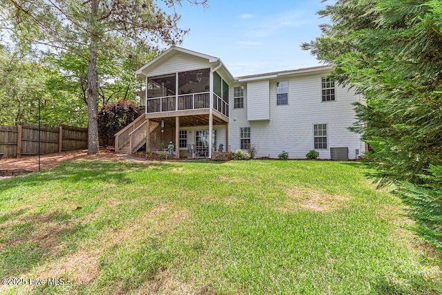 2 Beryl Cir, Pinehurst, NC 28374 - rear view of house with a sunroom, central AC, and stairs