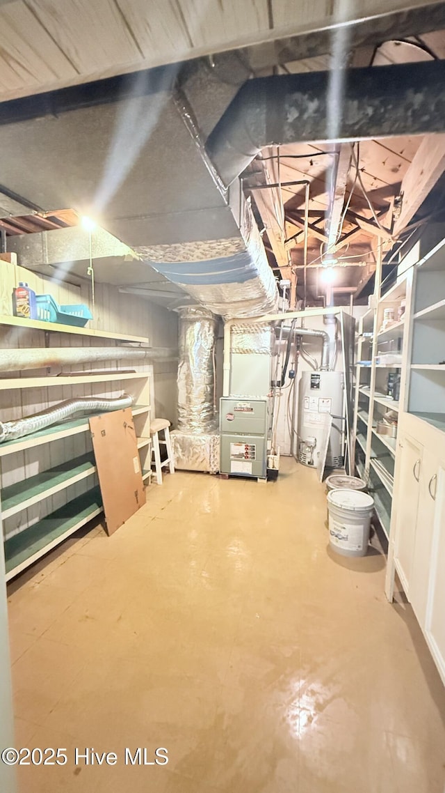 308 Terry St, Hamlet, NC 28345 - unfinished below grade area with water heater and heating unit
