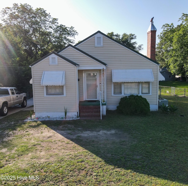 308 Terry St, Hamlet, NC 28345 - bungalow-style home with a chimney