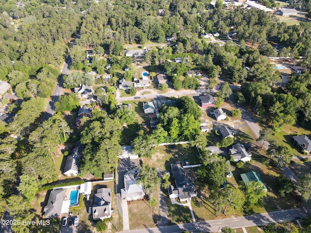 308 Terry St, Hamlet, NC 28345 - aerial overview of property's location featuring a heavily wooded area