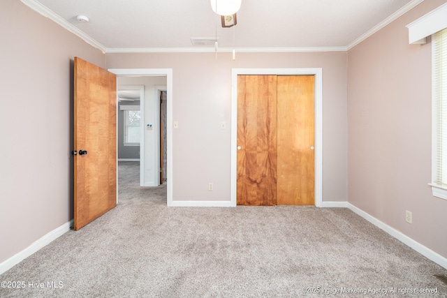 1363 Robert Everett Rd, Robersonville, NC 27871 - unfurnished bedroom featuring crown molding, carpet flooring, baseboards, and a closet