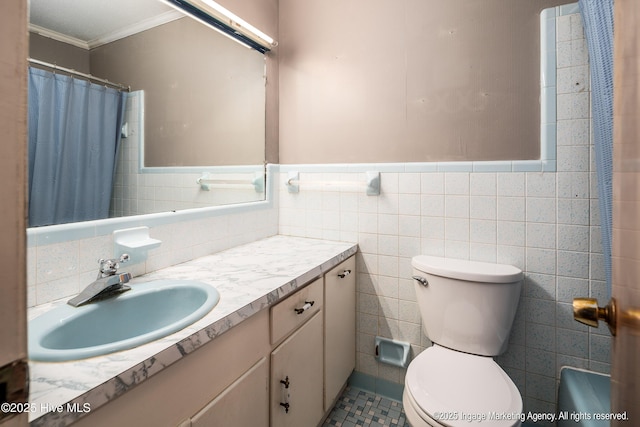 1363 Robert Everett Rd, Robersonville, NC 27871 - full bath with ornamental molding, tile walls, vanity, toilet, and a wainscoted wall