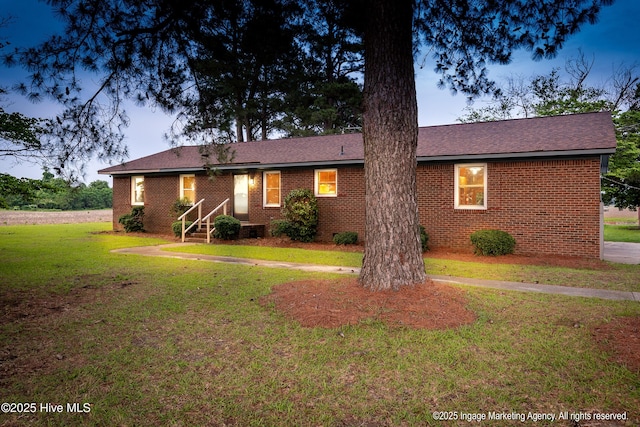 1363 Robert Everett Rd, Robersonville, NC 27871 - ranch-style house featuring a front yard and brick siding