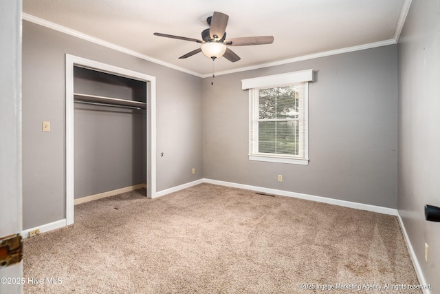 1363 Robert Everett Rd, Robersonville, NC 27871 - unfurnished bedroom with carpet floors, ornamental molding, a closet, baseboards, and ceiling fan