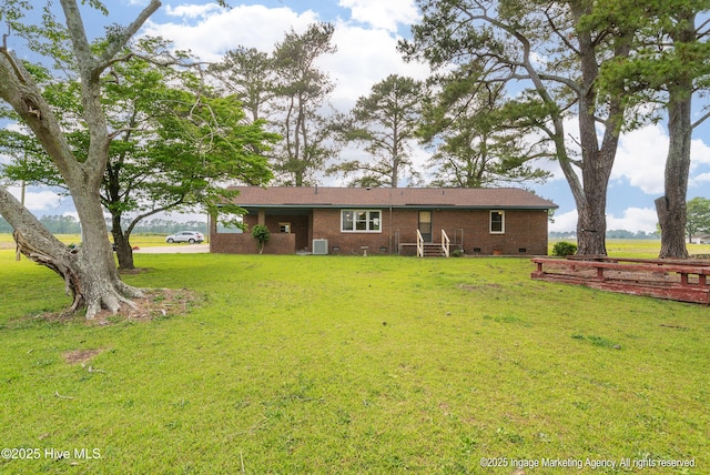 1363 Robert Everett Rd, Robersonville, NC 27871 - back of property featuring crawl space, a lawn, brick siding, and central AC unit