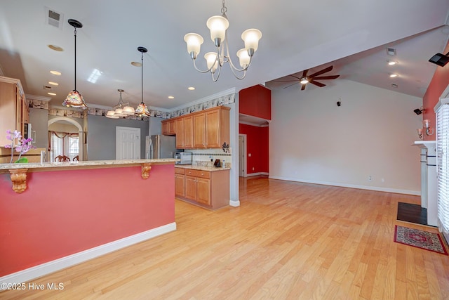 4029 Berberis Way, Wilmington, NC 28412 - kitchen with freestanding refrigerator, ceiling fan, a chandelier, light wood finished floors, and open floor plan