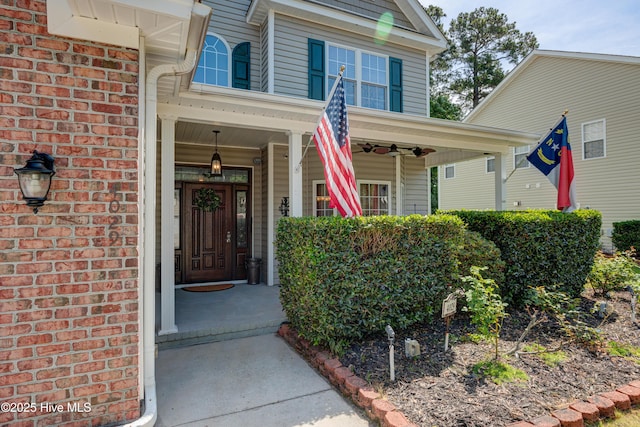 4029 Berberis Way, Wilmington, NC 28412 - view of exterior entry with covered porch and ceiling fan