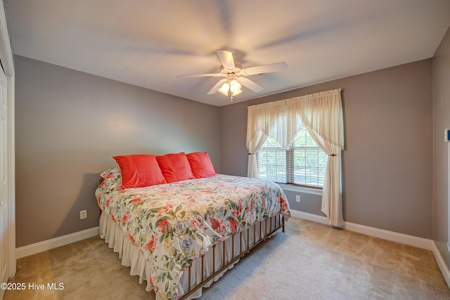 4029 Berberis Way, Wilmington, NC 28412 - bedroom with baseboards, light carpet, and ceiling fan