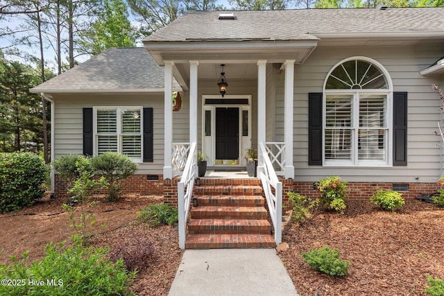 3 Merion Cir, Pinehurst, NC 28374 - view of exterior entry with crawl space, roof with shingles, and a porch