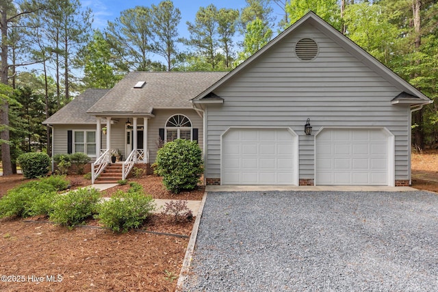 3 Merion Cir, Pinehurst, NC 28374 - view of front of house with driveway, roof with shingles, and a garage