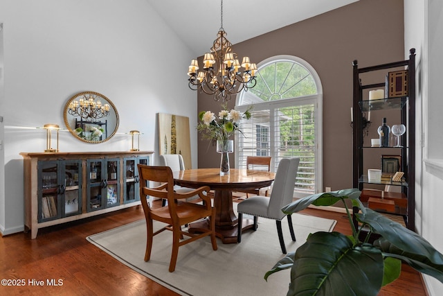 3 Merion Cir, Pinehurst, NC 28374 - dining room with a chandelier, high vaulted ceiling, and wood finished floors