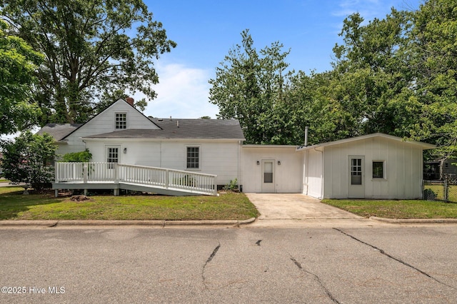 306 Oak Dr, Tarboro, NC 27886 - view of front of home with concrete driveway and a deck