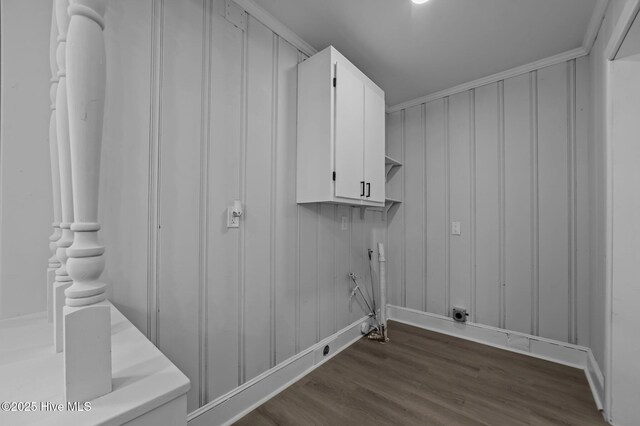 306 Oak Dr, Tarboro, NC 27886 - laundry room featuring dark wood-type flooring and baseboards