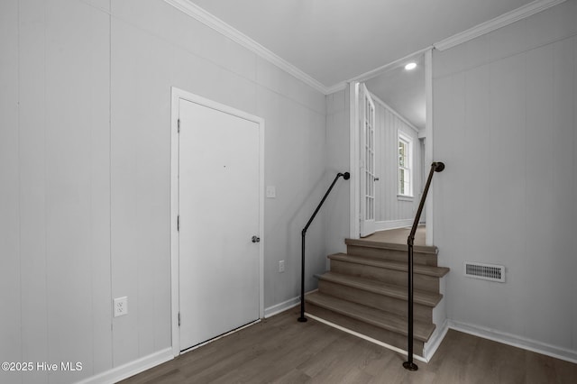 306 Oak Dr, Tarboro, NC 27886 - staircase featuring ornamental molding, wood finished floors, and baseboards