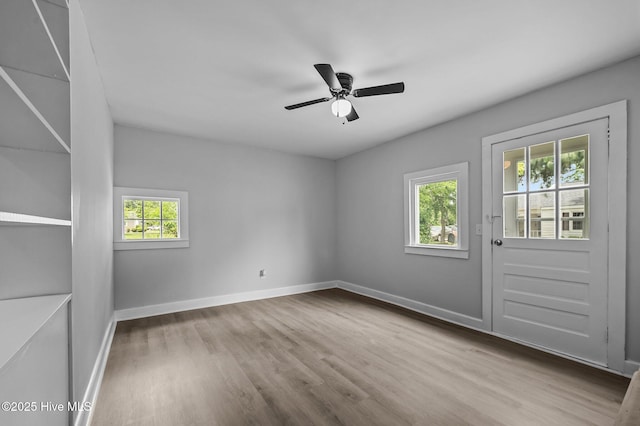 306 Oak Dr, Tarboro, NC 27886 - unfurnished room featuring wood finished floors, baseboards, and ceiling fan