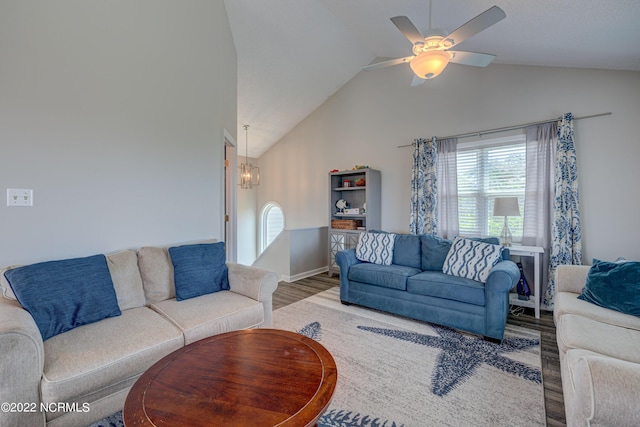 316 Bay Cir, North Topsail Beach, NC 28460 - living room with wood finished floors, high vaulted ceiling, a chandelier, baseboards, and ceiling fan