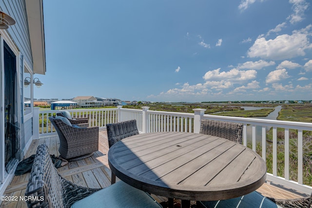 316 Bay Cir, North Topsail Beach, NC 28460 - wooden deck with outdoor dining space