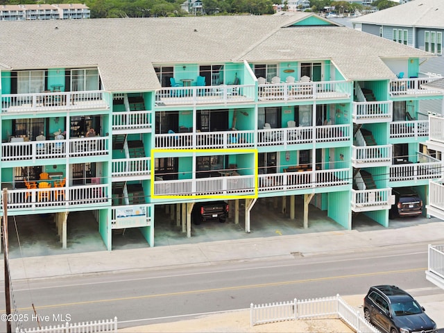 1013 Carolina Beach Ave N Unit 1F, Carolina Beach, NC 28428 - view of apartment building / complex with a parking lot