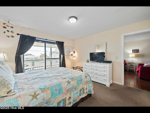 1013 Carolina Beach Ave N Unit 1F, Carolina Beach, NC 28428 - carpeted bedroom with access to outside and baseboards