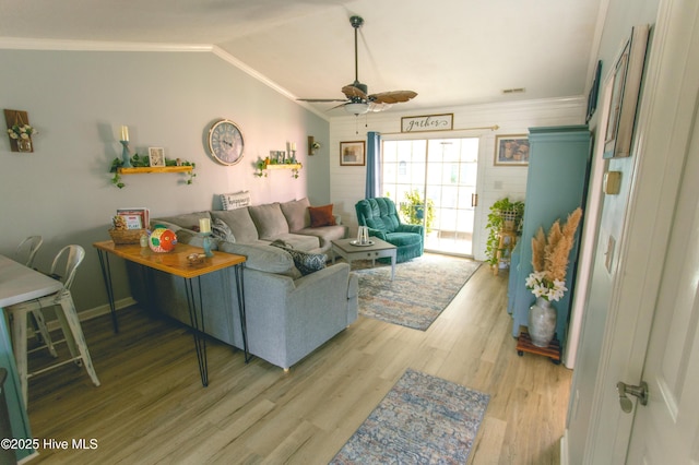 132 Charlton Rd, Hubert, NC 28539 - living area featuring ceiling fan, light wood-type flooring, ornamental molding, lofted ceiling, and baseboards
