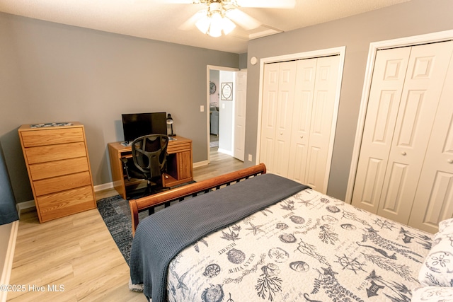 132 Charlton Rd, Hubert, NC 28539 - bedroom featuring light wood-style floors, two closets, baseboards, and a ceiling fan