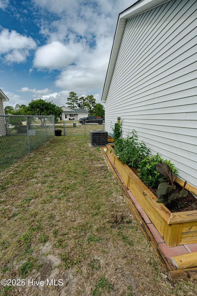 132 Charlton Rd, Hubert, NC 28539 - view of yard with central AC