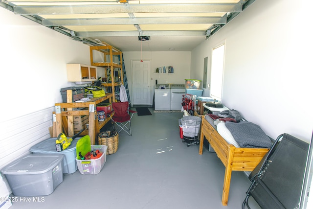 132 Charlton Rd, Hubert, NC 28539 - garage with washing machine and dryer and a garage door opener