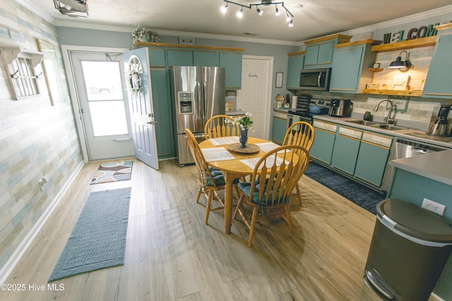 132 Charlton Rd, Hubert, NC 28539 - dining area featuring ornamental molding and light wood-style flooring