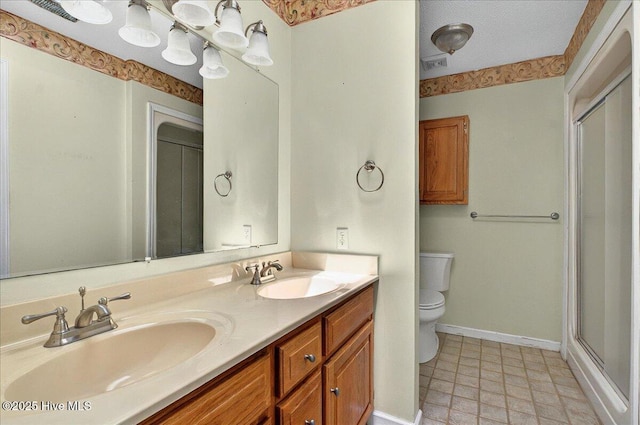 2 Pinewood Dr, Calabash, NC 28467 - full bath with toilet, double vanity, a shower with shower door, and baseboards