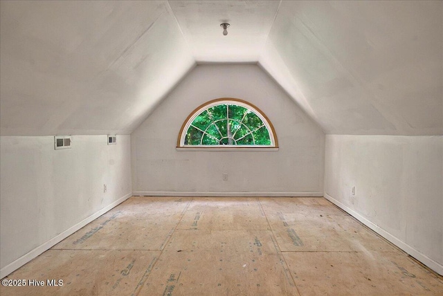 2 Pinewood Dr, Calabash, NC 28467 - additional living space featuring vaulted ceiling and baseboards