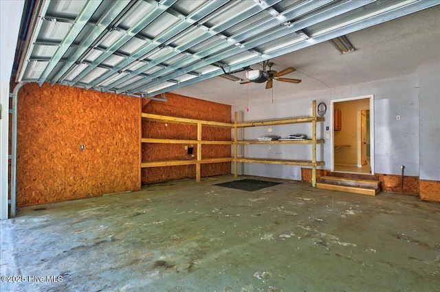 2 Pinewood Dr, Calabash, NC 28467 - garage with a garage door opener and a ceiling fan