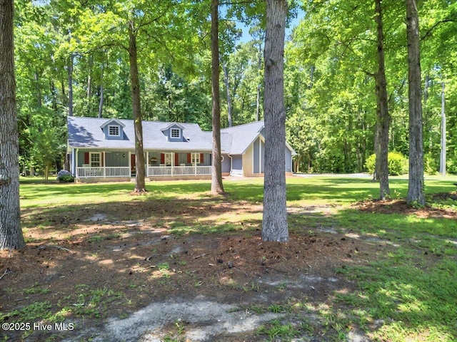 2 Pinewood Dr, Calabash, NC 28467 - view of front of property with a porch and a front yard