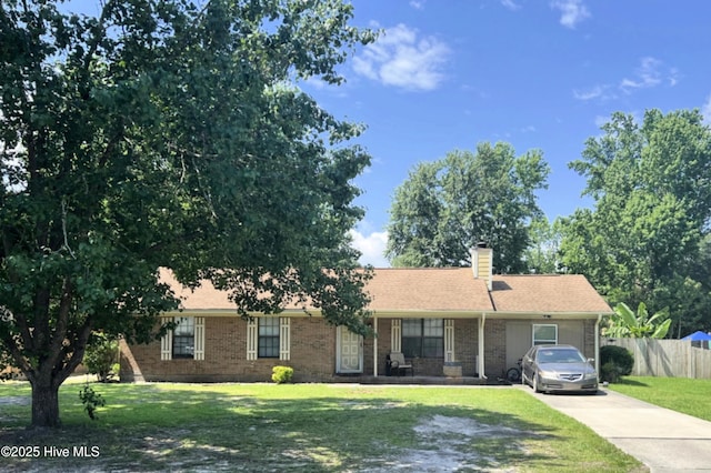 4448 Jamey Ct, Wilmington, NC 28405 - ranch-style house featuring driveway, brick siding, and a chimney