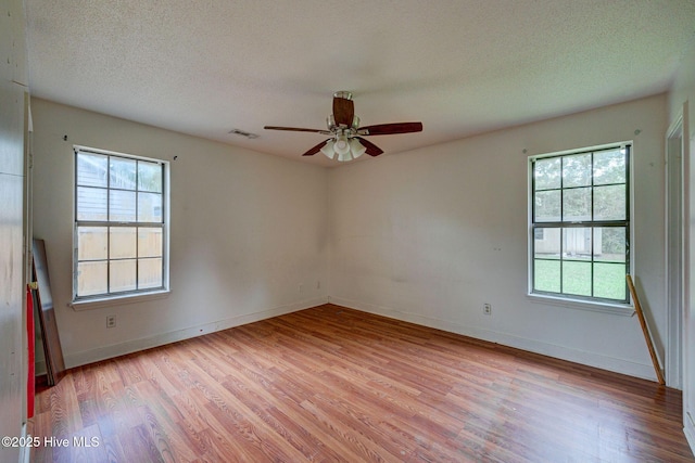 4448 Jamey Ct, Wilmington, NC 28405 - empty room featuring wood finished floors, ceiling fan, a textured ceiling, and baseboards