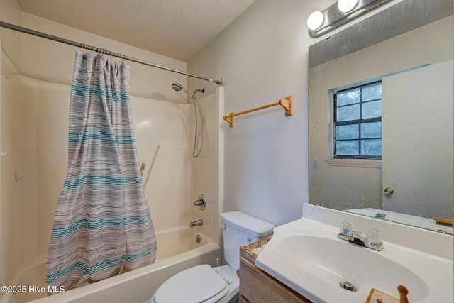 4448 Jamey Ct, Wilmington, NC 28405 - full bathroom featuring shower / tub combo, toilet, vanity, and a textured ceiling