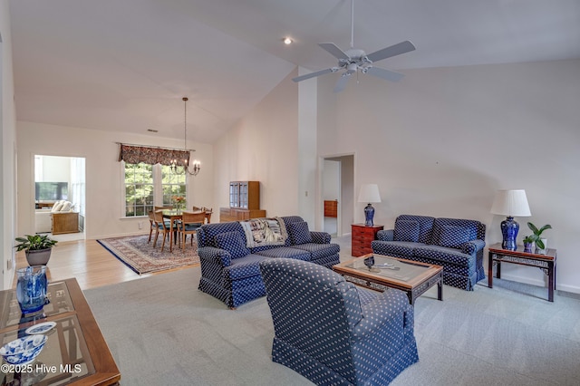 315 Thomas Pl, Washington, NC 27889 - living room featuring a chandelier, high vaulted ceiling, a ceiling fan, and baseboards
