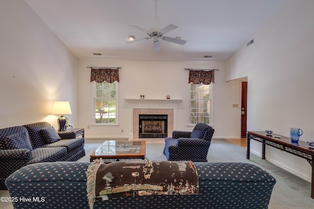 315 Thomas Pl, Washington, NC 27889 - carpeted living area with a ceiling fan, a tile fireplace, and baseboards