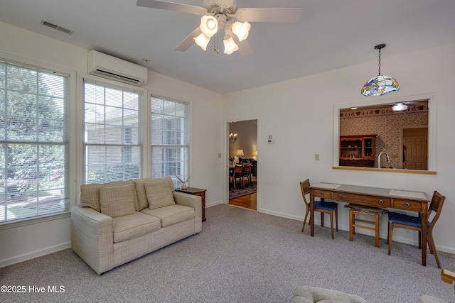 315 Thomas Pl, Washington, NC 27889 - carpeted living area featuring a wall unit AC, healthy amount of natural light, and baseboards