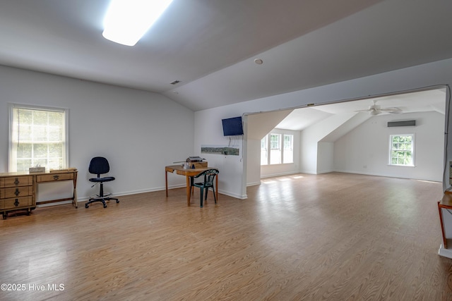 315 Thomas Pl, Washington, NC 27889 - bonus room featuring vaulted ceiling, healthy amount of natural light, wood finished floors, ceiling fan, and a wall unit AC
