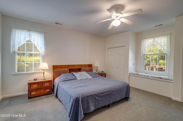 315 Thomas Pl, Washington, NC 27889 - carpeted bedroom featuring a closet, ceiling fan, and baseboards